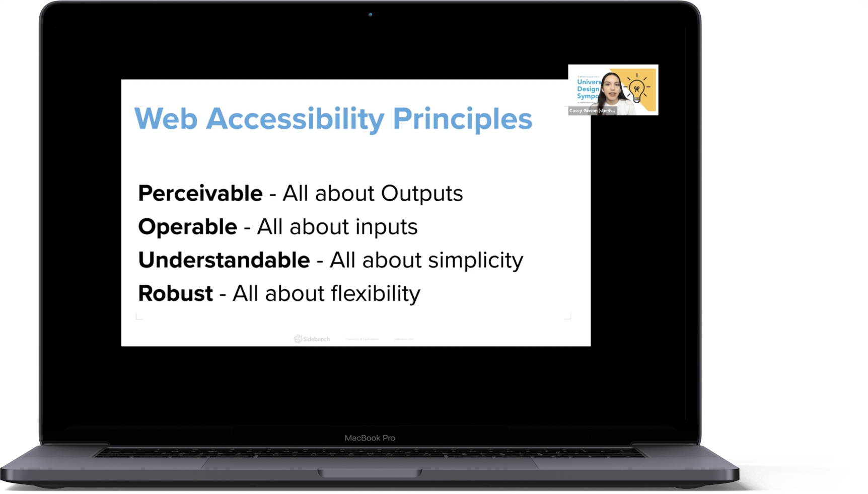 Macbook Pro showing a slide from the workshop on Web Accessibility Principles